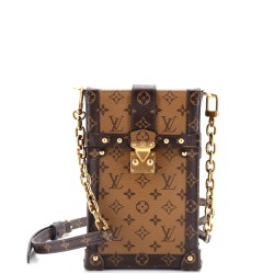 Vertical Trunk Pochette Reverse Monogram Canvas